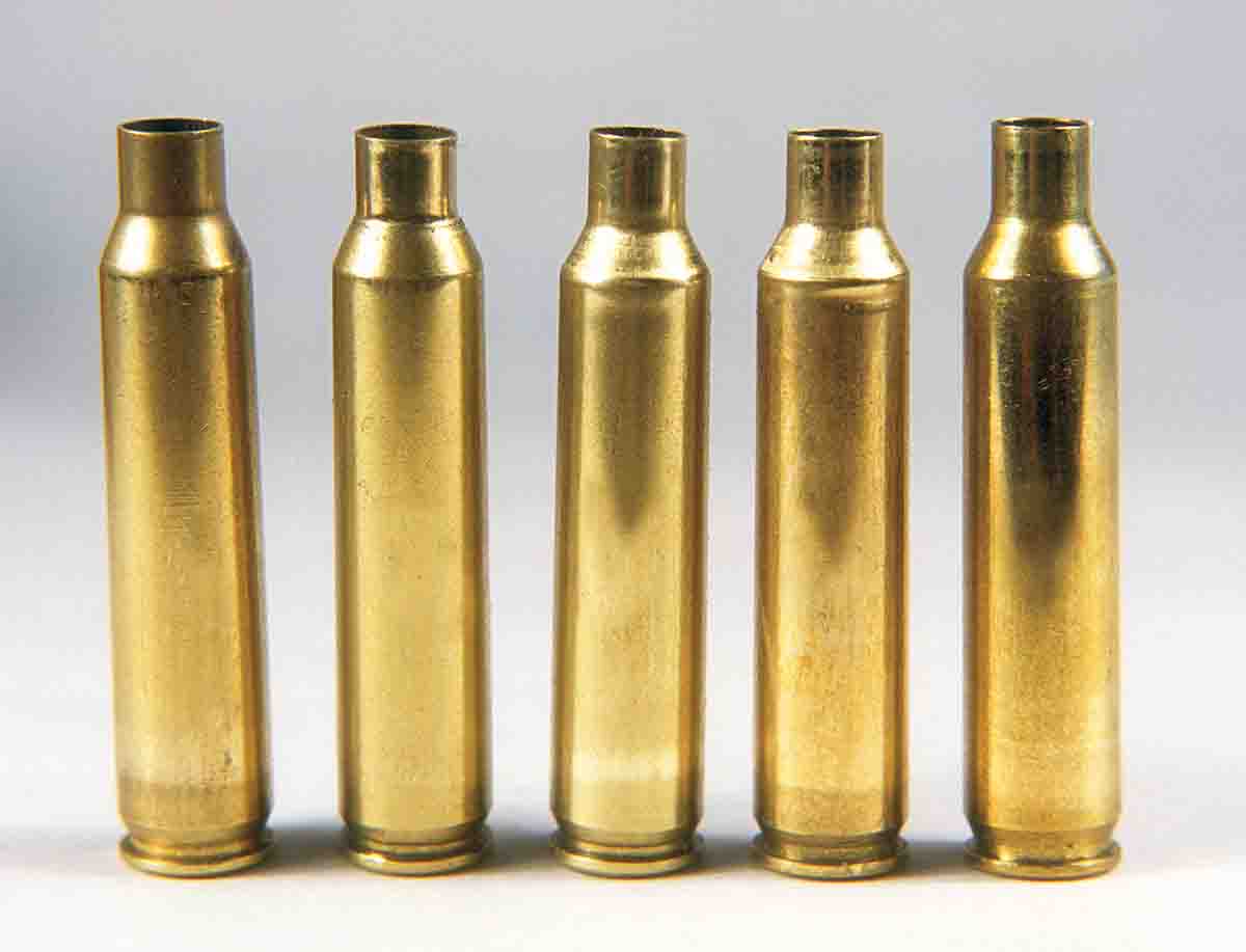 From left: the .223 Remington case full-length resized, a case run through the .20 Tactical seating die, a case full-length sized in the .20 Tactical die, the .223 Remington  case after form-and-trim die use (note the wrinkle below the shoulder), the .20 Tactical case fireformed.